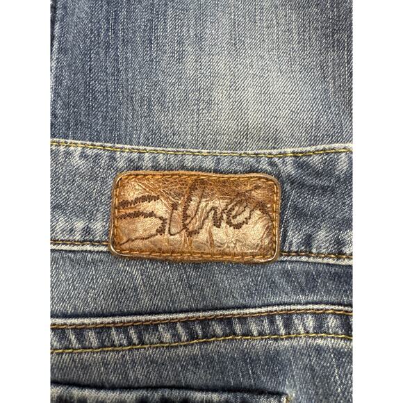 Silver Jeans, Suki Surplus 29/32 Distressed Flare Jeans - Picture 5 of 9